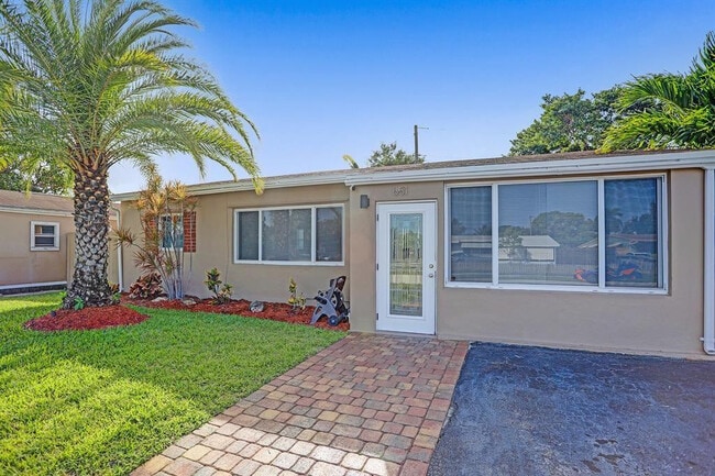 651 NE 59th Ct in Oakland Park, FL - Building Photo - Building Photo
