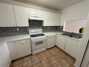 8851 NW 119th St in Hialeah Gardens, FL - Building Photo - Building Photo