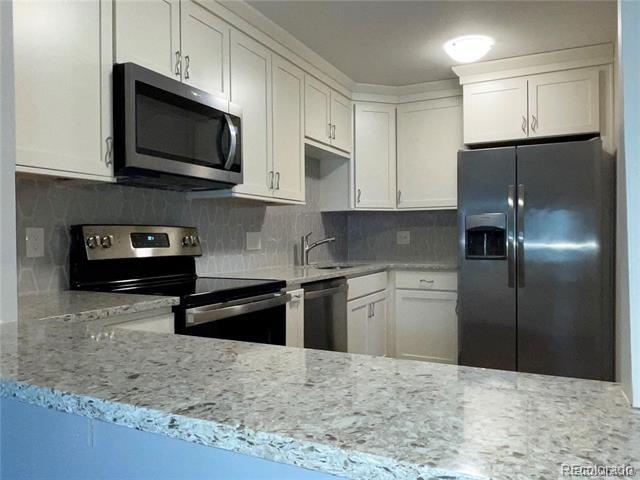 13606 E Bates Ave in Aurora, CO - Building Photo - Building Photo