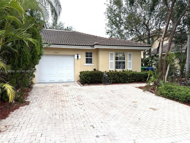 property at 8989 NW 53rd St