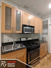 540 W Surf St, Unit #548-GDN in Chicago, IL - Building Photo - Building Photo