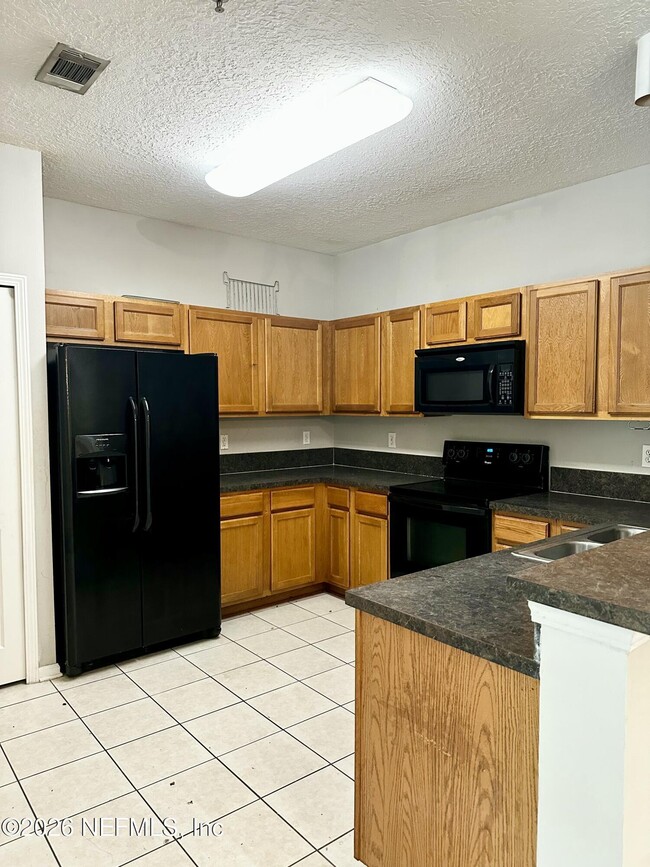 property at 6985 Ortega Woods Dr