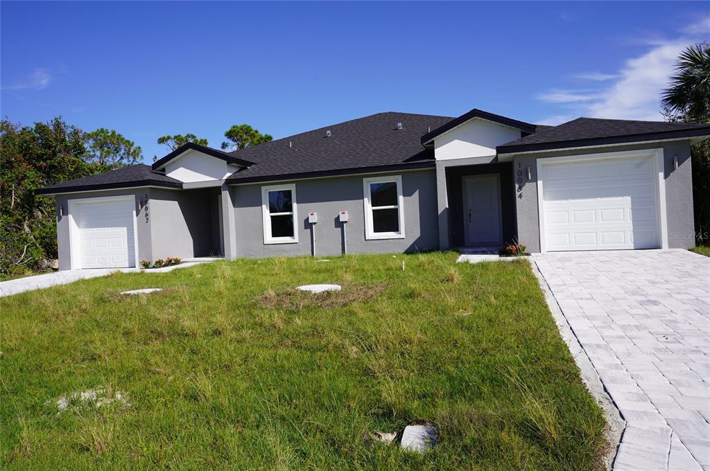 10062 Amicola St in Port Charlotte, FL - Building Photo