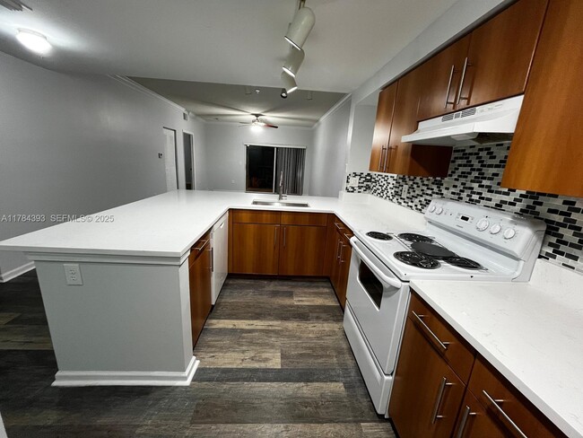 5900 W Sample Rd in Coral Springs, FL - Building Photo - Building Photo