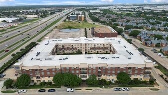 1100 W Trinity Mills Rd in Carrollton, TX - Building Photo