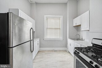 1909 MCCULLOH St-Unit -A in Baltimore, MD - Building Photo - Building Photo