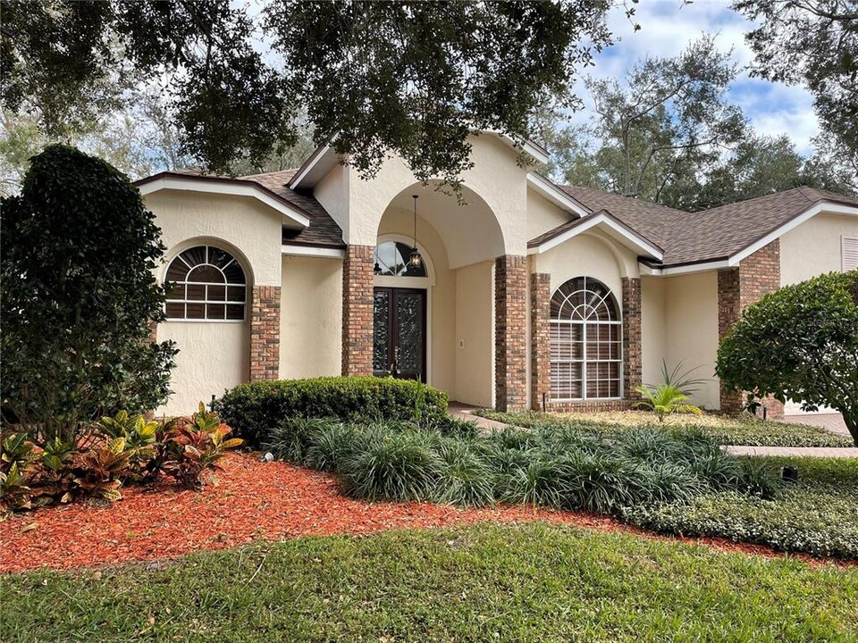 7725 Apple Tree Cir in Orlando, FL - Building Photo