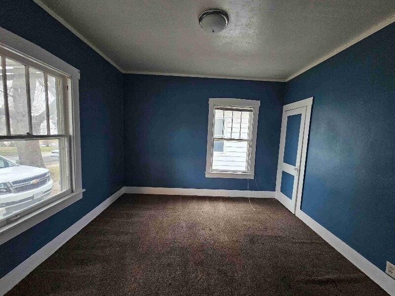 711 W Hanssler Pl in Peoria, IL - Building Photo