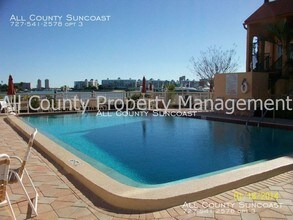 8911 Blind Pass Rd-Unit -111 in St Pete Beach, FL - Building Photo - Building Photo