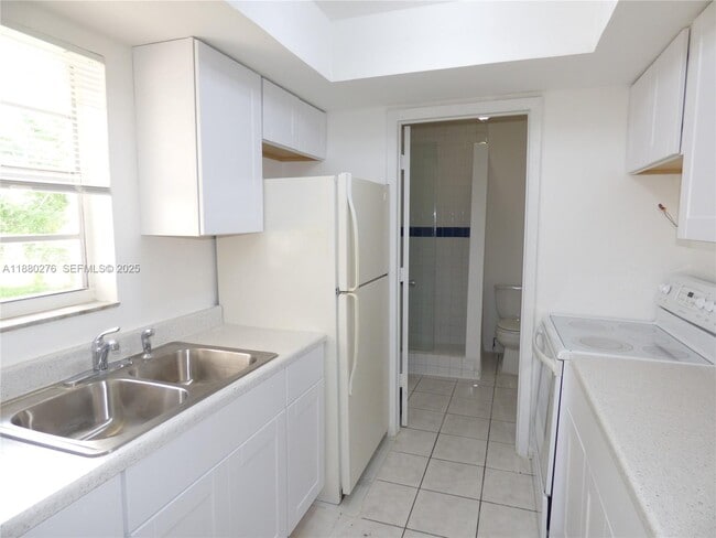 property at 3560 NW 8th St