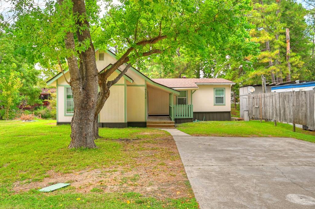 9574 Darkwood St in Willis, TX - Building Photo