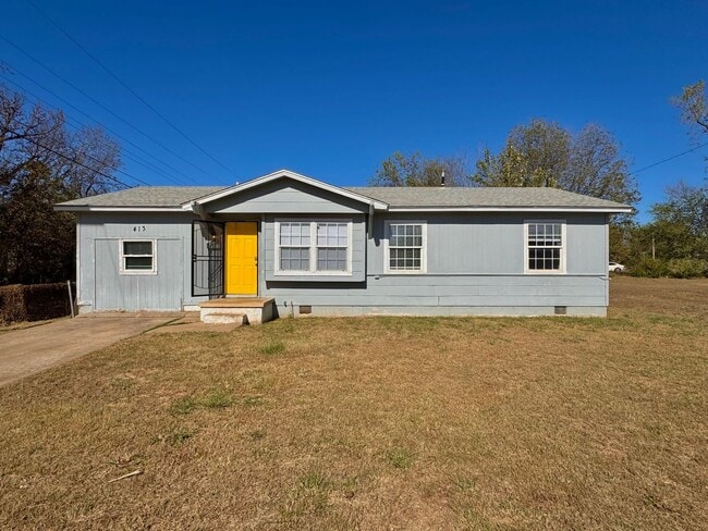 property at 413 E 58th St N