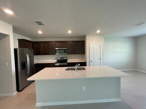 9581 Rally Spring Lp in Wesley Chapel, FL - Building Photo - Building Photo