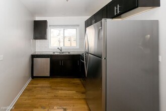 7549 N Bell Ave-Unit -Unit 2C in Chicago, IL - Building Photo - Building Photo