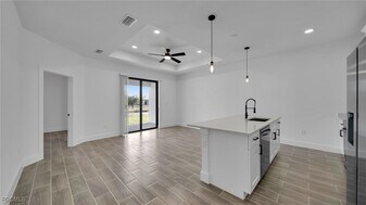 1121 Hightower Ave S in Lehigh Acres, FL - Building Photo