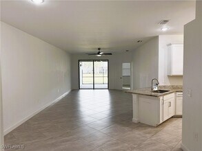 14063 Winding Cedar Wy in Miromar Lakes, FL - Building Photo - Building Photo