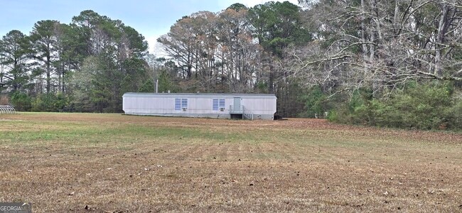 property at 2611 Sharpsburg McCollum Rd