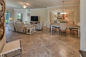 9512 Napoli Ln, Unit 101 in Naples, FL - Building Photo - Building Photo