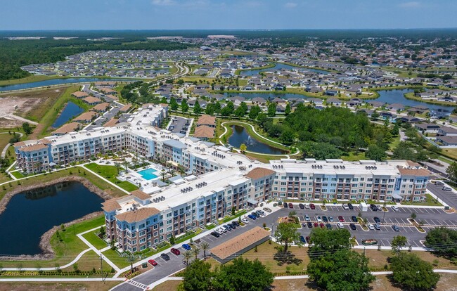 Osprey Park 62+ Apartments & Cottages in Kissimmee, FL - Building Photo - Building Photo