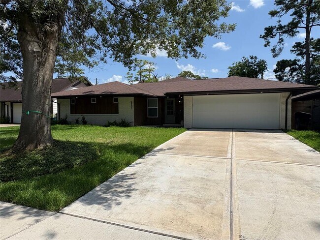 property at 6407 Woodbrook Ln