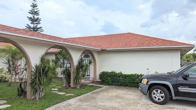 9214 E Highland Pines Blvd in Palm Beach Gardens, FL - Foto de edificio - Building Photo