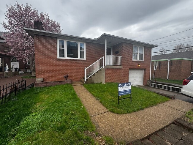 property at 119 E 3rd St