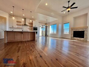 Gorgeous 4 bed 3 bath + Office home located on the 12th Tee of the TPC golf Course! in Berthoud, CO - Building Photo - Building Photo