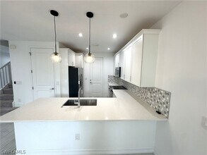 7509 Carnegie Way in Naples, FL - Building Photo - Building Photo