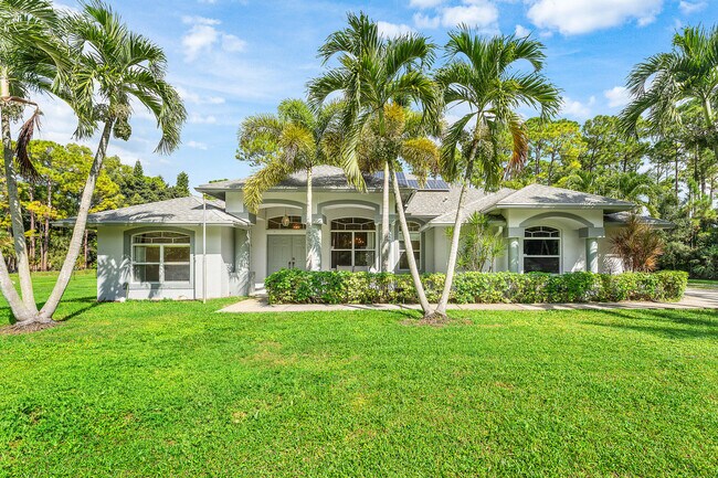 14693 62nd Ct N in The Acreage, FL - Building Photo - Building Photo