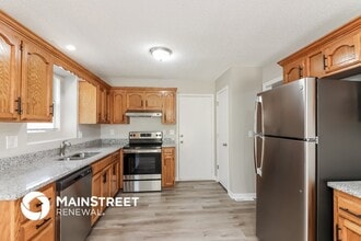 306 W Sierra Dr in Raymore, MO - Building Photo - Building Photo