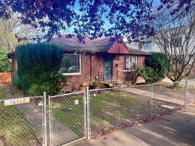 property at 7643 SE Alder St