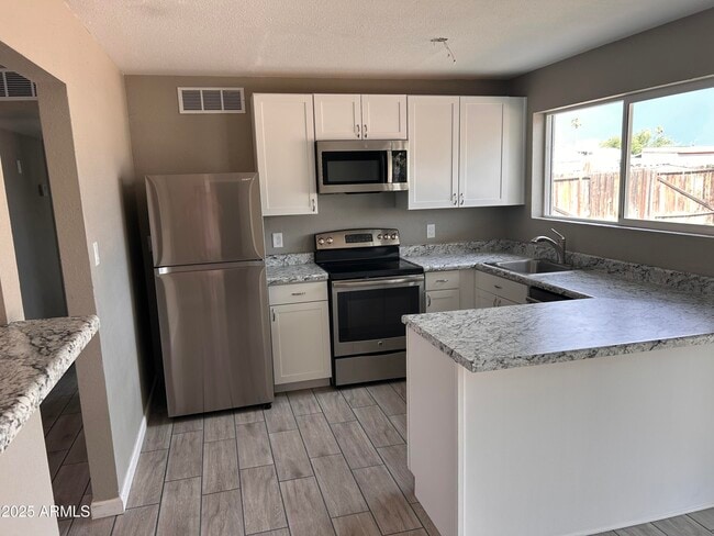 4736 E Burgess Ln in Phoenix, AZ - Building Photo - Building Photo