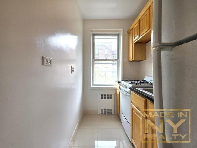 property at 64-41 Saunders St