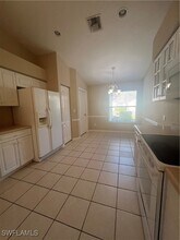 8103 Ibis Cove Cir in Naples, FL - Foto de edificio - Building Photo