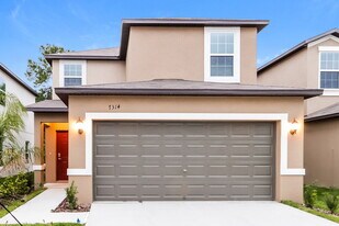 7314 Spring Snowflake Ave in Palm River-Clair Mel, FL - Building Photo