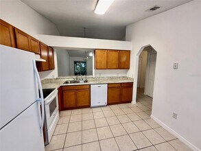 1128 Jade E Ln in Kissimmee, FL - Building Photo - Building Photo