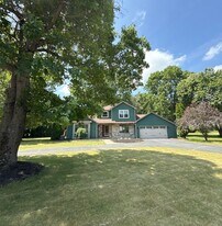 9 Pheasant Walk in Queensbury, NY - Building Photo