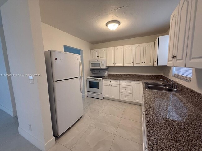 property at 3440 NW 4th St