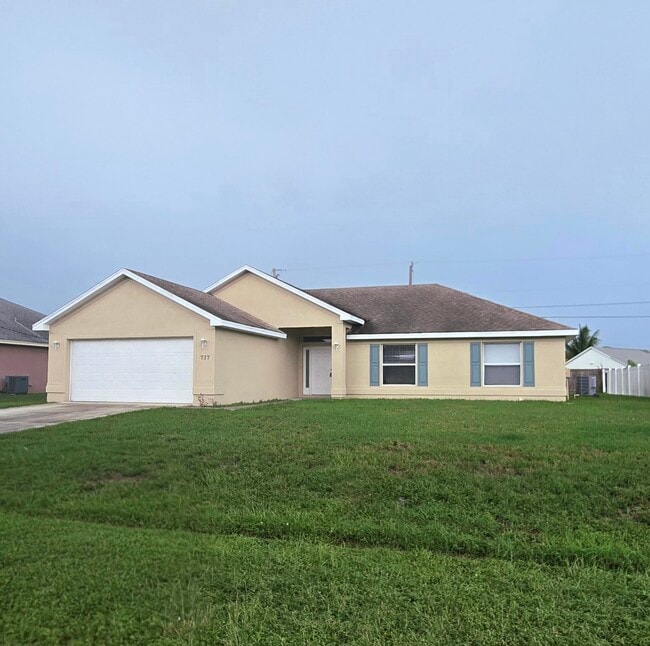 property at 737 SW Jordin Ave