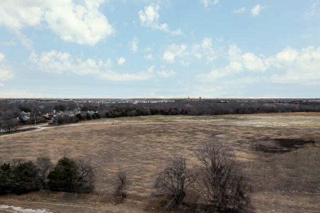 The Woodlands on Spring Creek in Garland, TX - Building Photo - Building Photo