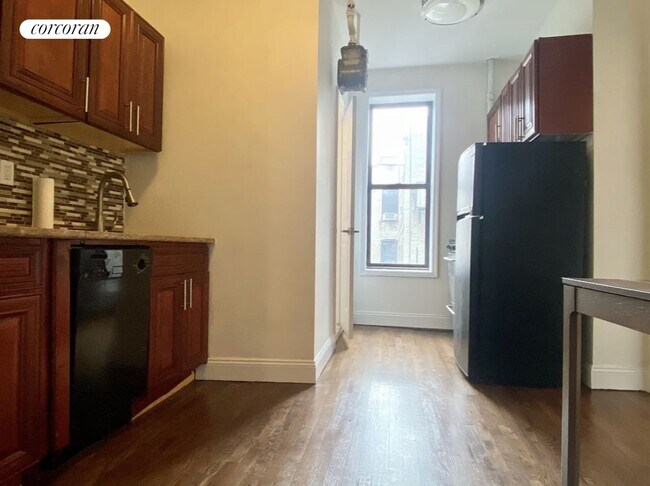 property at 215 E 4th St