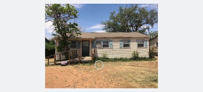 property at 3013 E 3rd St