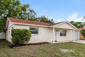 7921 Eugene Dr in Port Richey, FL - Building Photo - Building Photo