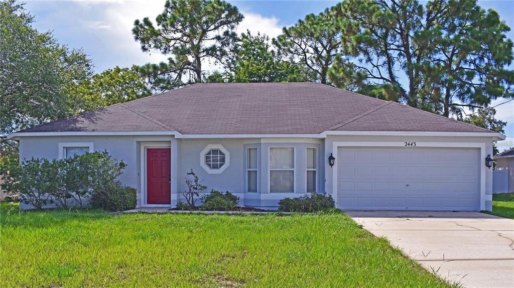 2443 Ambassador Ave in Spring Hill, FL - Building Photo