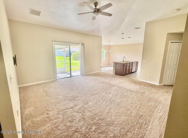 1072 Flintlock Ave SE in Palm Bay, FL - Building Photo - Building Photo