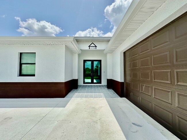 1313 Floyd Ave S in Lehigh Acres, FL - Building Photo - Building Photo