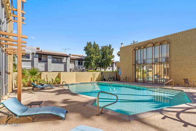 property at 6928 E 3rd St