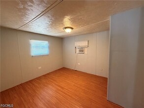 8028 Breeze Dr in North Fort Myers, FL - Building Photo - Building Photo