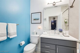 7480 Rockefeller Dr in Naples, FL - Building Photo - Building Photo