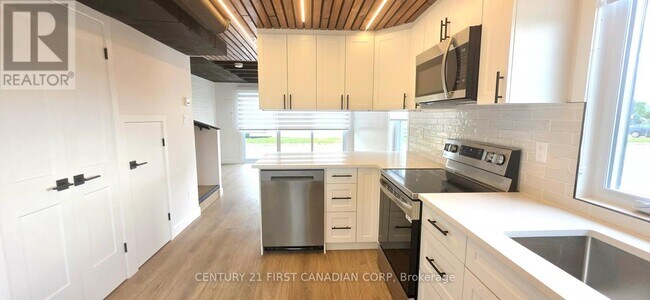 property at 857-857 Dundas St